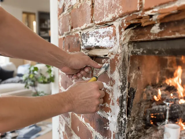 Routine fireplace repair by Medfield Chimney Sweep in Medfield, MA